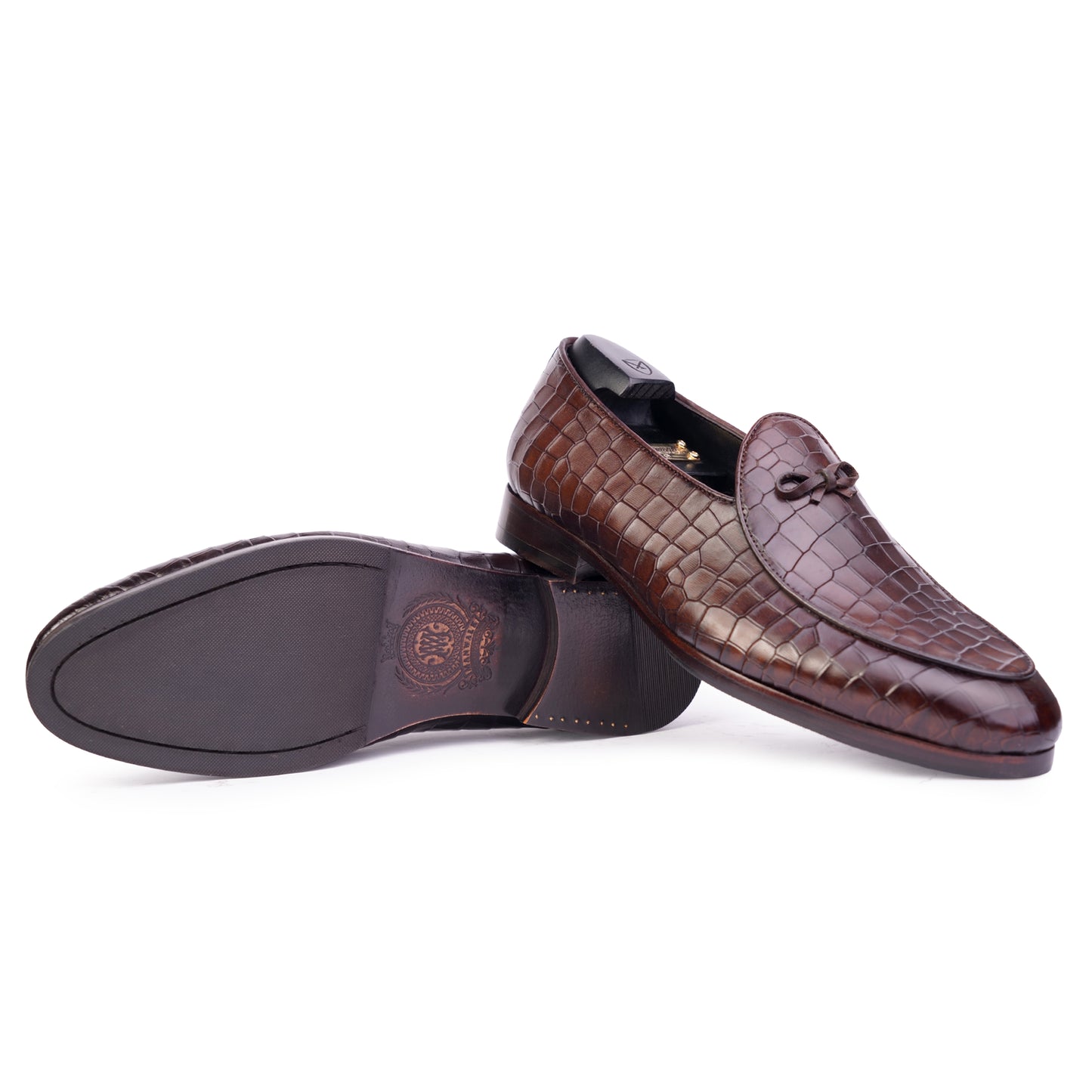Side view and outsole view of Dark brown coloured Belgian loafer formal shoes in leather with Blake stitched leather sole