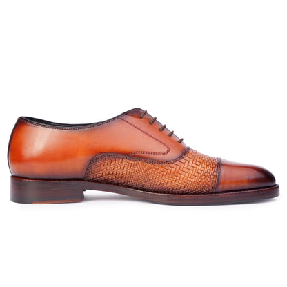 side view of Two tone Spectators in Reddish Brown colour Captoe formal shoes in leather with Blake stitched leather sole
