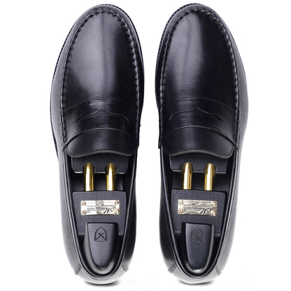 Top view Black colour Penny loafer formal shoes in leather with Blake stitched leather sole
